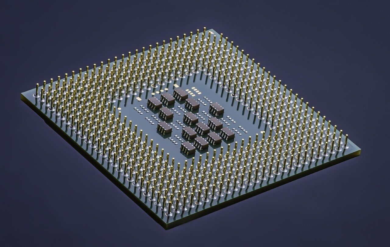 An extreme close-up of a microchip on a circuit board